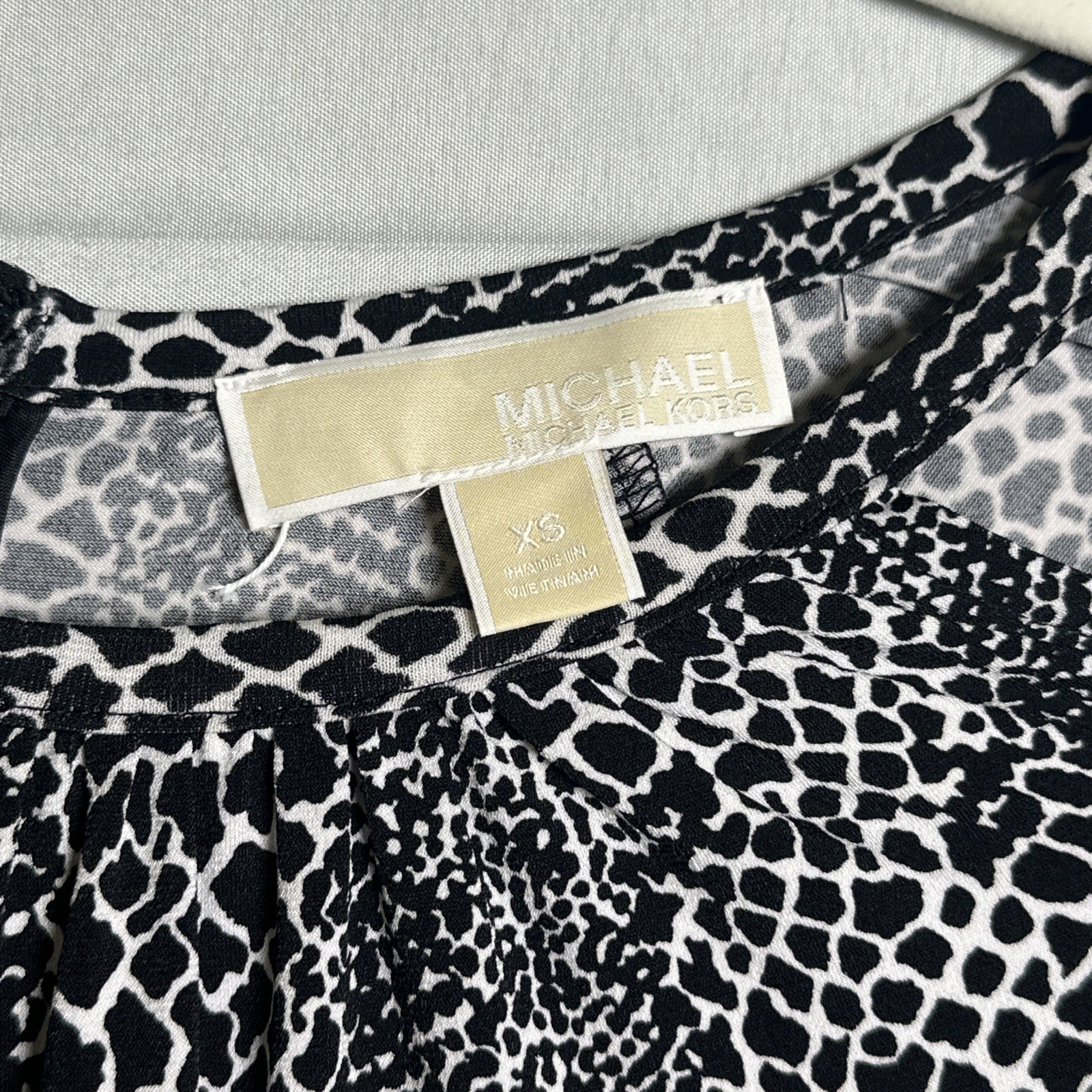 #84 Michael Kors Black/White Animal Print w/Cutouts Dress in size XS