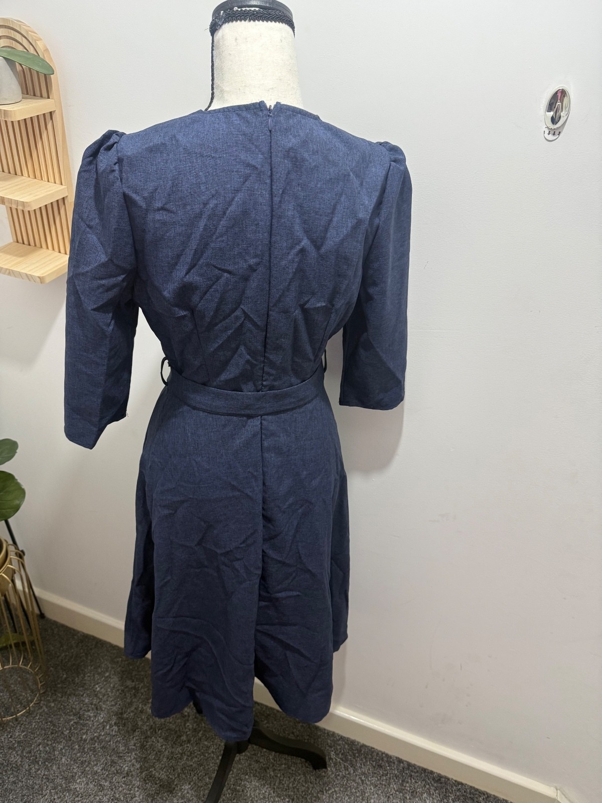 Elegant Blue Knee-Length Dress with Fabric Belt, Bow Tie Neckline, and Button-Up